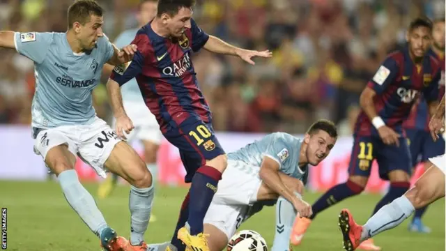 Lionel Messi runs with the ball