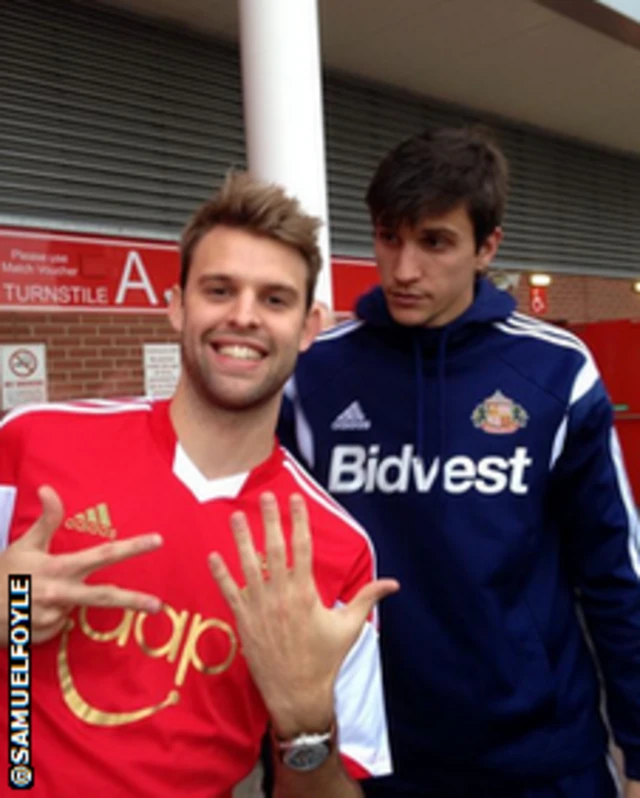 A Southampton fan with Santiago Vergini