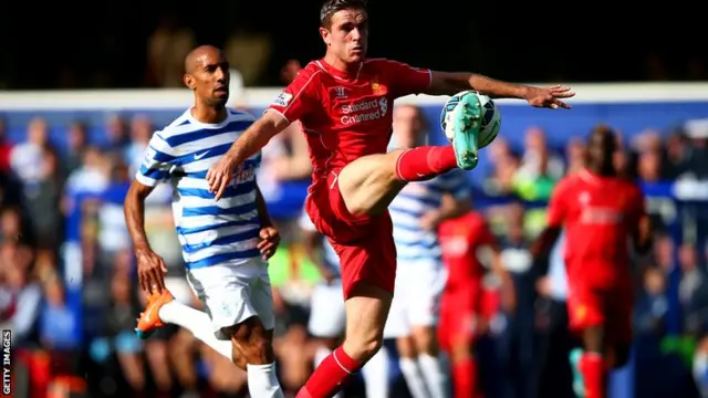 Jordan Henderson controls the ball