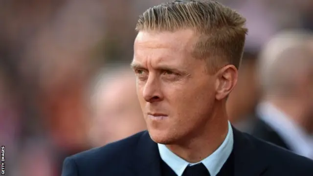 Gary Monk looks on