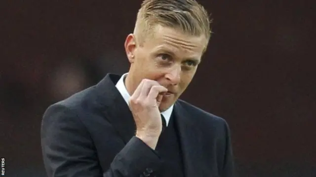 Gary Monk looks on