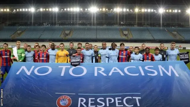 Say no to racism banner