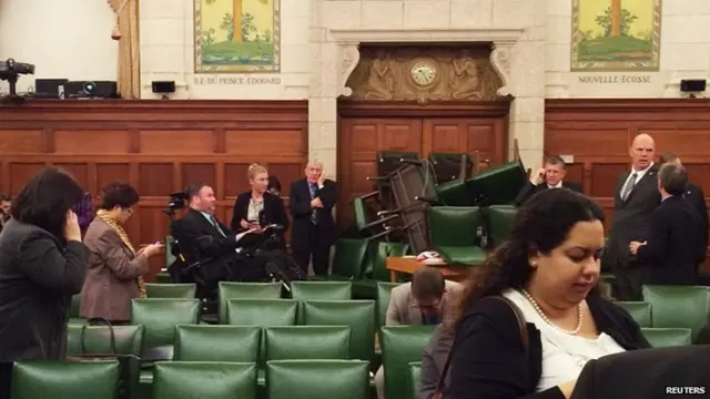 Conservative Party caucus room is shown shortly after shooting began. 22 Oct 2014