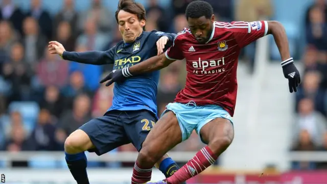 David Silva challenges Alex Song