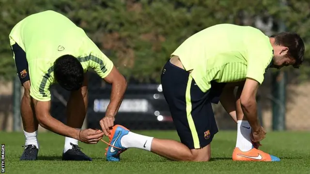 Luis Suarez and Gerard Pique