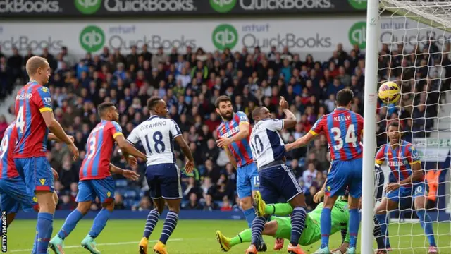 West Brom's Victor Anichebe scores