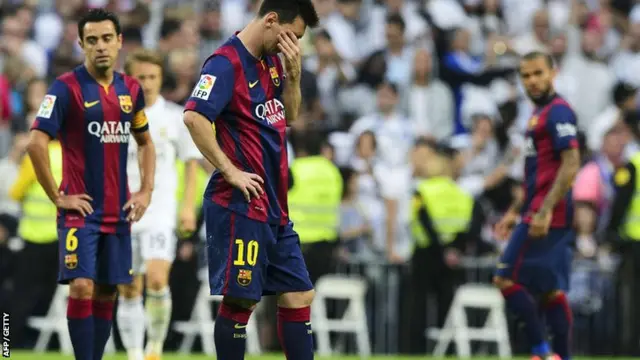 Messi and his Barcelona team mates react to Real Madrid's third goal