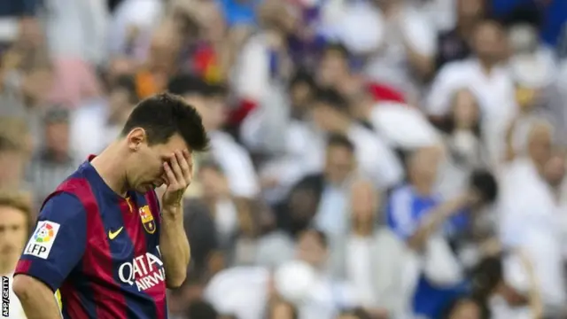 Messi reacts after missing a free kick against Real Madrid
