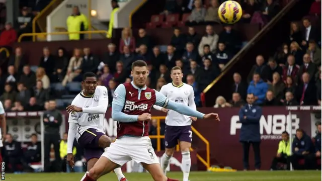 Everton striker Samuel Eto scores his side's third goal against Burnley