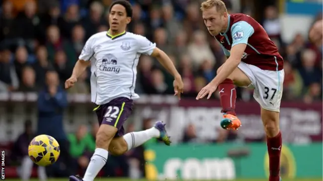 Burnley forward Scott Arfield shoots towards goal