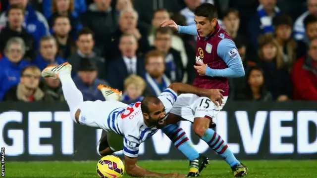 QPR and Villa players clash