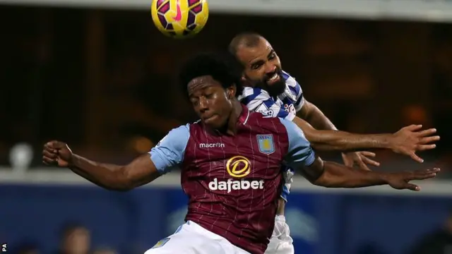 Aston Villa's Sanchez and QPR's Sandro go up for the ball