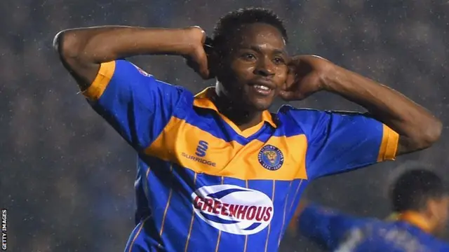 Shrewsbury striker Jean-Louis Akpa Akpro hits the woodwork