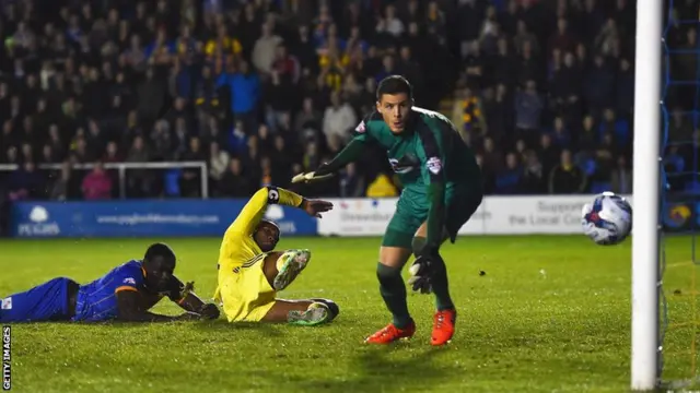 Jermaine Grandison puts it into his own goal