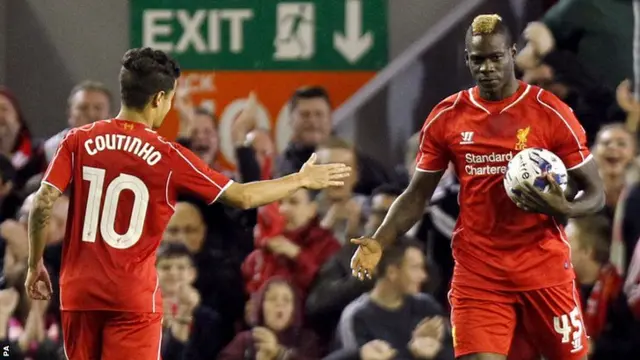 Mario Balotelli celebrates for Liverpool