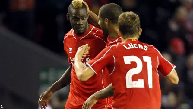 Mario Balotelli celebrates for Liverpool