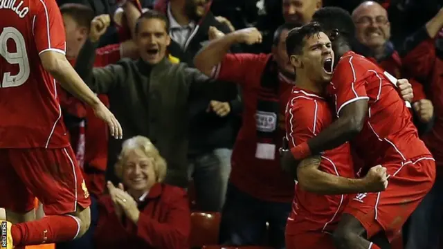 Dejan Lovren celebrates for Liverpool