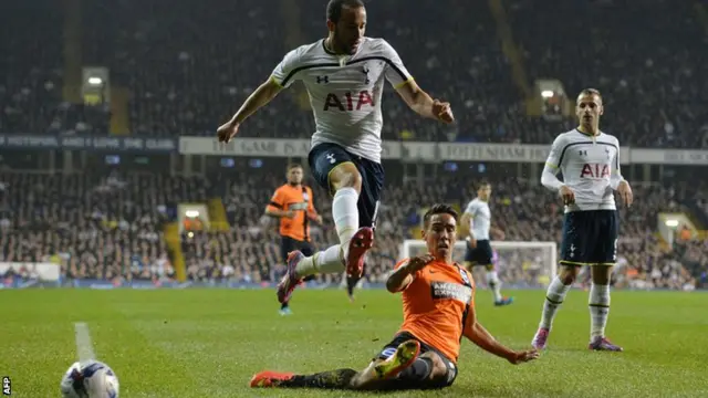 Andros Townsend is tackled against Brighton