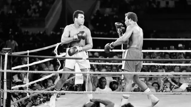 Muhammad Ali fends off George Foreman