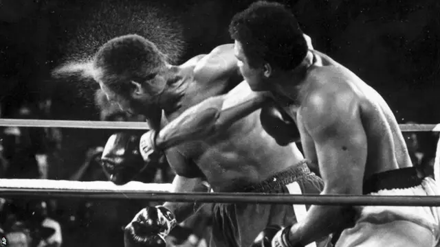 Muhammad Ali lands a right cross on George Foreman