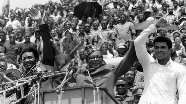 Muhammad Ali and George Foreman with President Seko