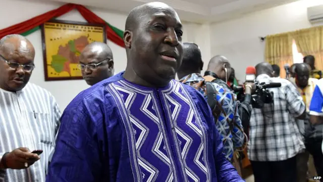 Burkinabe opposition leader Zephirin Diabre arrives to hold a press conference after the resignation of Burkina Faso"s president in Ouagadougou on October 31, 2014