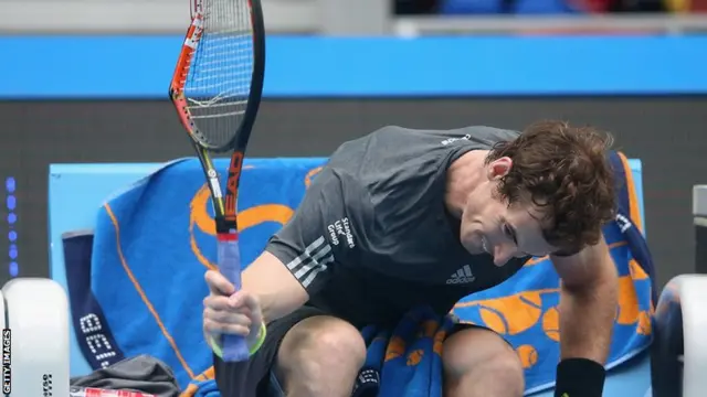 Andy Murray breaks his racquet against Novak Djokovic