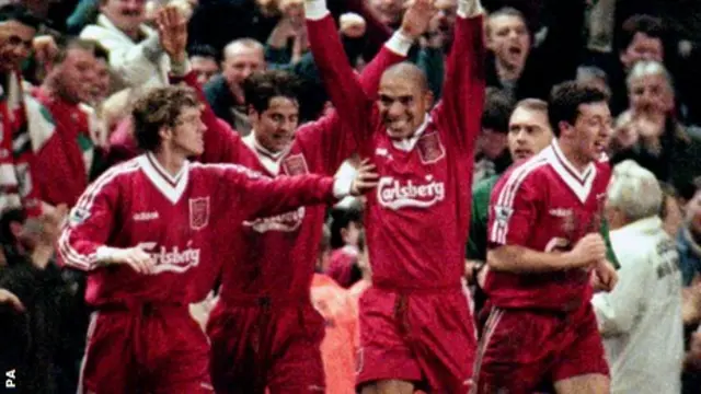 Stan Collymore celebrates