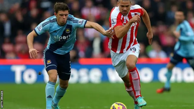 West Ham's Aaron Cresswell and Stoke's Jonathan Walters