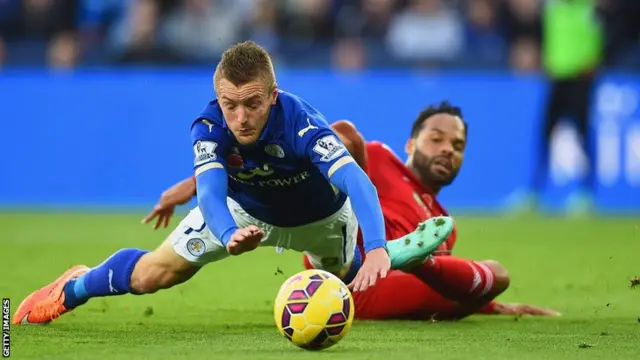 Leicester's Jamie Vardy is brought down by Joleon Lescott