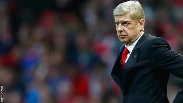 Arsenal manager Arsene Wenger watches from the touchline