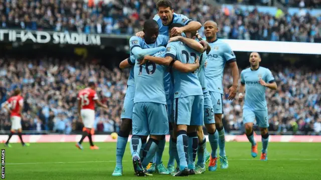 Manchester City players celebrate