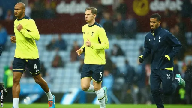 Tottenham players warm up before the match