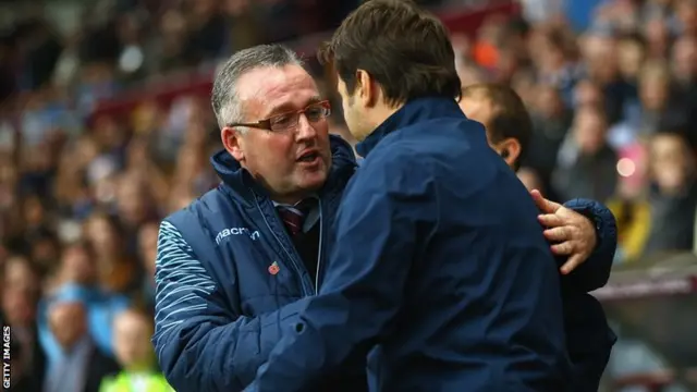 Paul Lambert shakes hands with Mauricio Pochettino