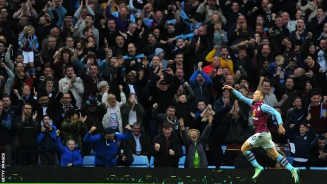 Aston Villa fans celebrate