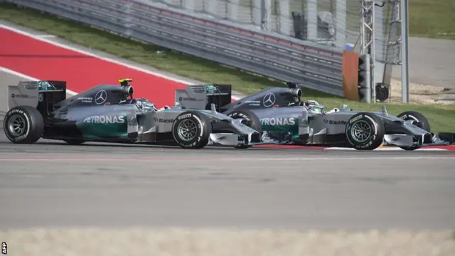 Mercedes driver Lewis Hamilton overtakes Nico Rosberg