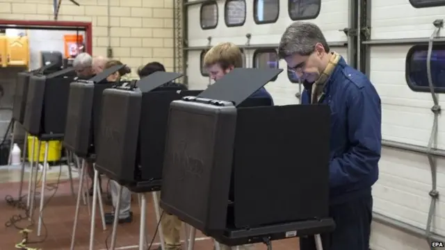 Voters cast their ballots in the mid-term general elections in Arlington, Virginia, USA, 04 November 2014