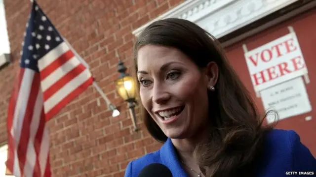 Democratic Senate candidate and Kentucky Secretary of State Alison Lundergan Grimes (D-KY) answers questions after casting her vote in Lexington, Kentucky, 4 November 2014