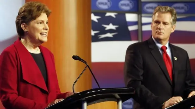 US Senator Jeanne Shaheen, D-Maine, left, answers a question during a live televised debate with her Republican opponent, former Massachusetts US Senator Scott Brown in Manchester, New Hampshire, 30 October 2014