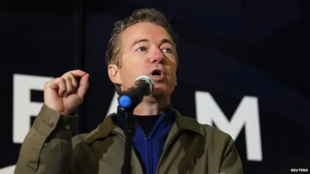 US Senator Rand Paul (R-KY) addresses the crowd about US Senate minority leader Mitch McConnell during a campaign rally for Senator McConnell at Bowman Field airport in Louisville, Kentucky, 3 November 2014