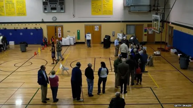 Kentucky voters line up to cast their votes in the nation's midterm election at Northside Elementary School in Midway, Kentucky, 4 November 2014