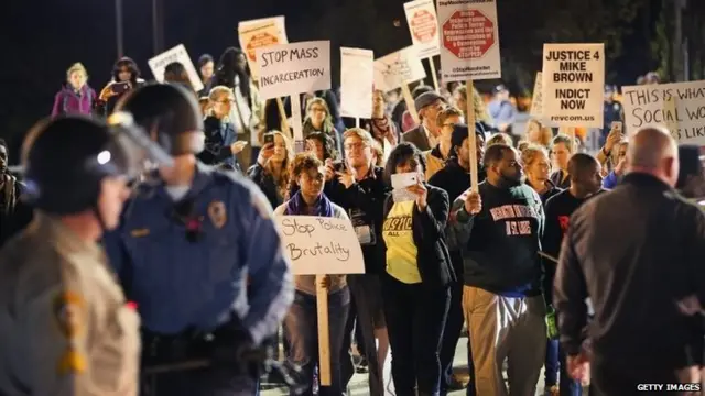 File photo: Police face off with demonstrators as protests continue in the wake of 18-year-old Michael Brown's death in Ferguson, Missouri, 22 October 2014