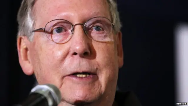 US Senate minority leader Mitch McConnell addresses the crowd during a campaign rally at Bowman Field airport in Louisville, Kentucky, 3 November 2014