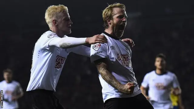 Johnny Russell celebrates