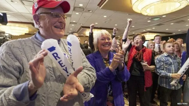 Supporters of Republican candidate Joni Ernst react as the results begin to come in at a Republican election night rally for the U.S. midterm elections in West Des Moines, Iowa, 4 November 2014