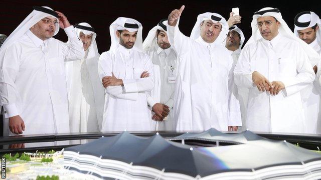 Hassan Al Thawadi (third left) says Qatar is happy to stage the World Cup at any time of year