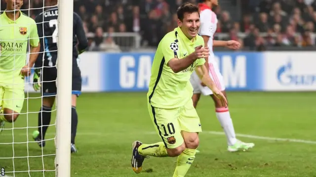 Barcelona forward Lionel Messi celebrates scoring against Ajax in the Champions League