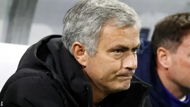 Jose Mourinho looks on