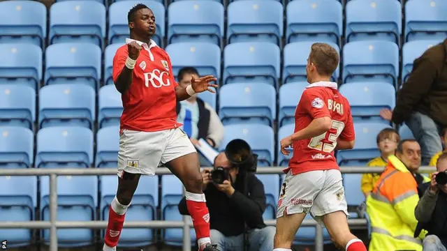 Kieran Agard celebrates a goal for Bristol City