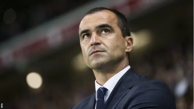 Roberto Martinez looks on